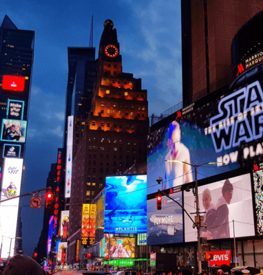 Times Square billboards at night, cover for iOS 14.5 App Tracking Transparency's impact on publishers