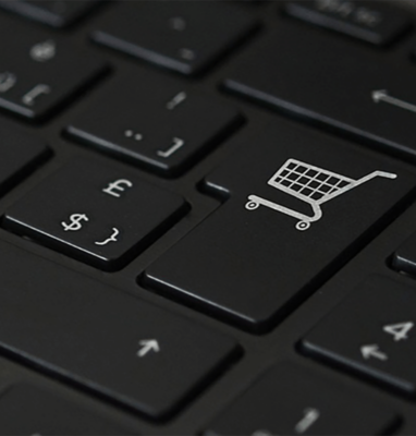 Keyboard key with a shopping cart, cover for What Is Live Shopping
