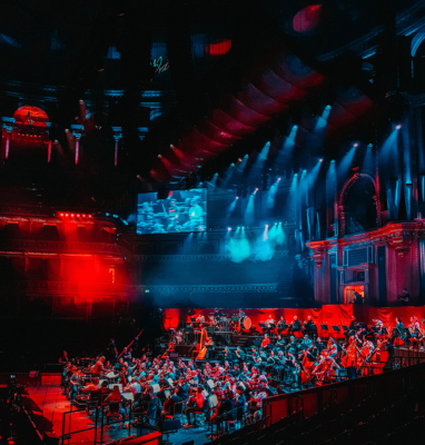 Concert hall with stage lighting and audience, illustrating live event streaming with MaelStrom Live