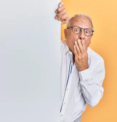 Shocked man peeking around a wall, reacting to StackPath CDN being discontinued