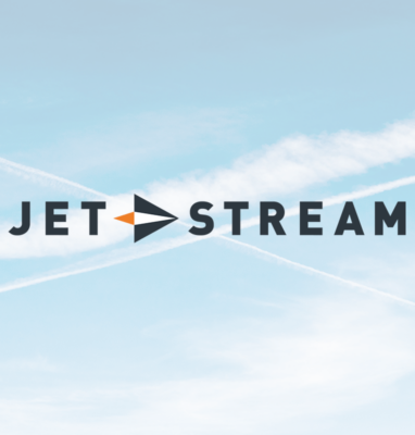 Jet-Stream logo against a sky with clouds